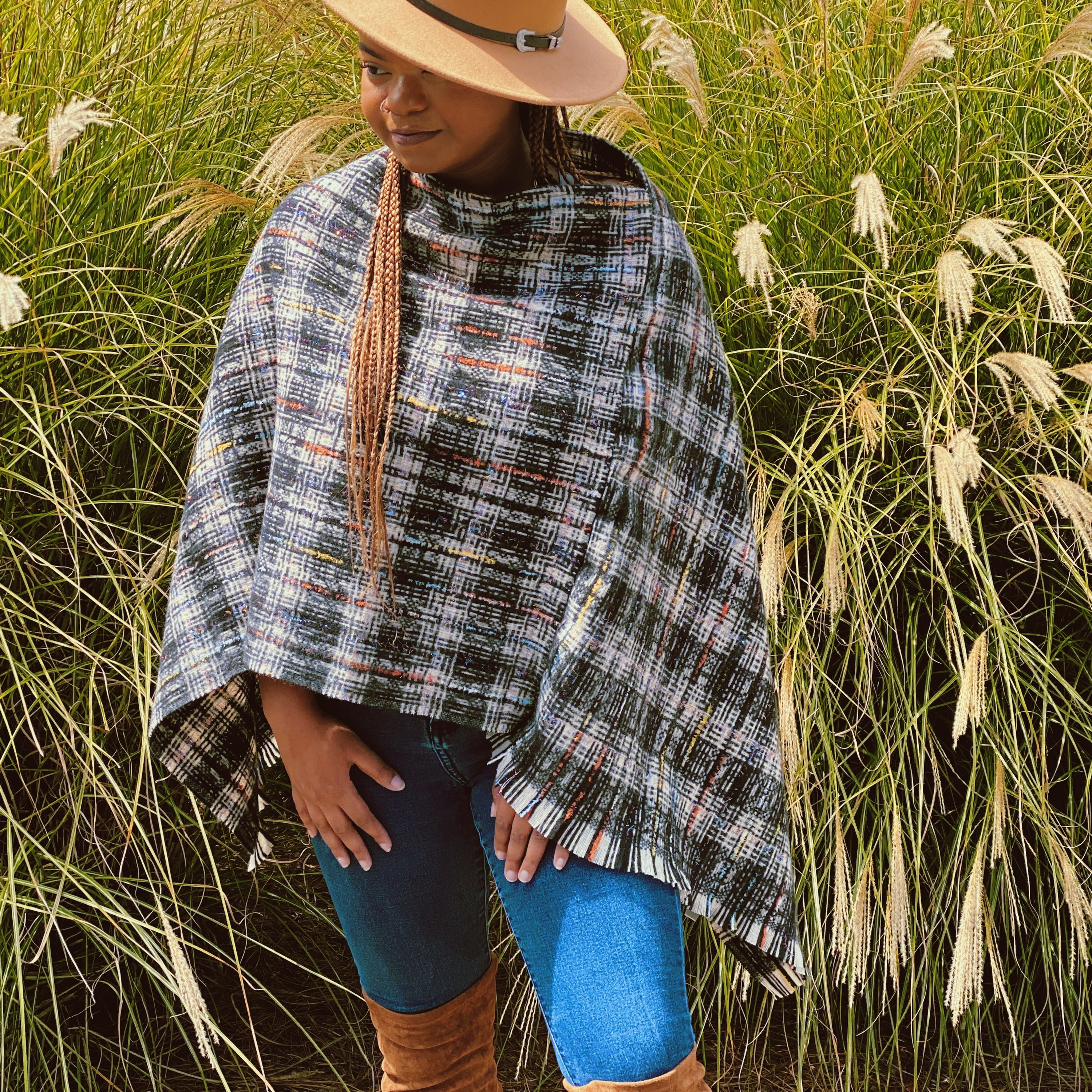 Tweed Please Luxe Poncho featuring a luxurious plaid pattern, perfect for stylish layering.