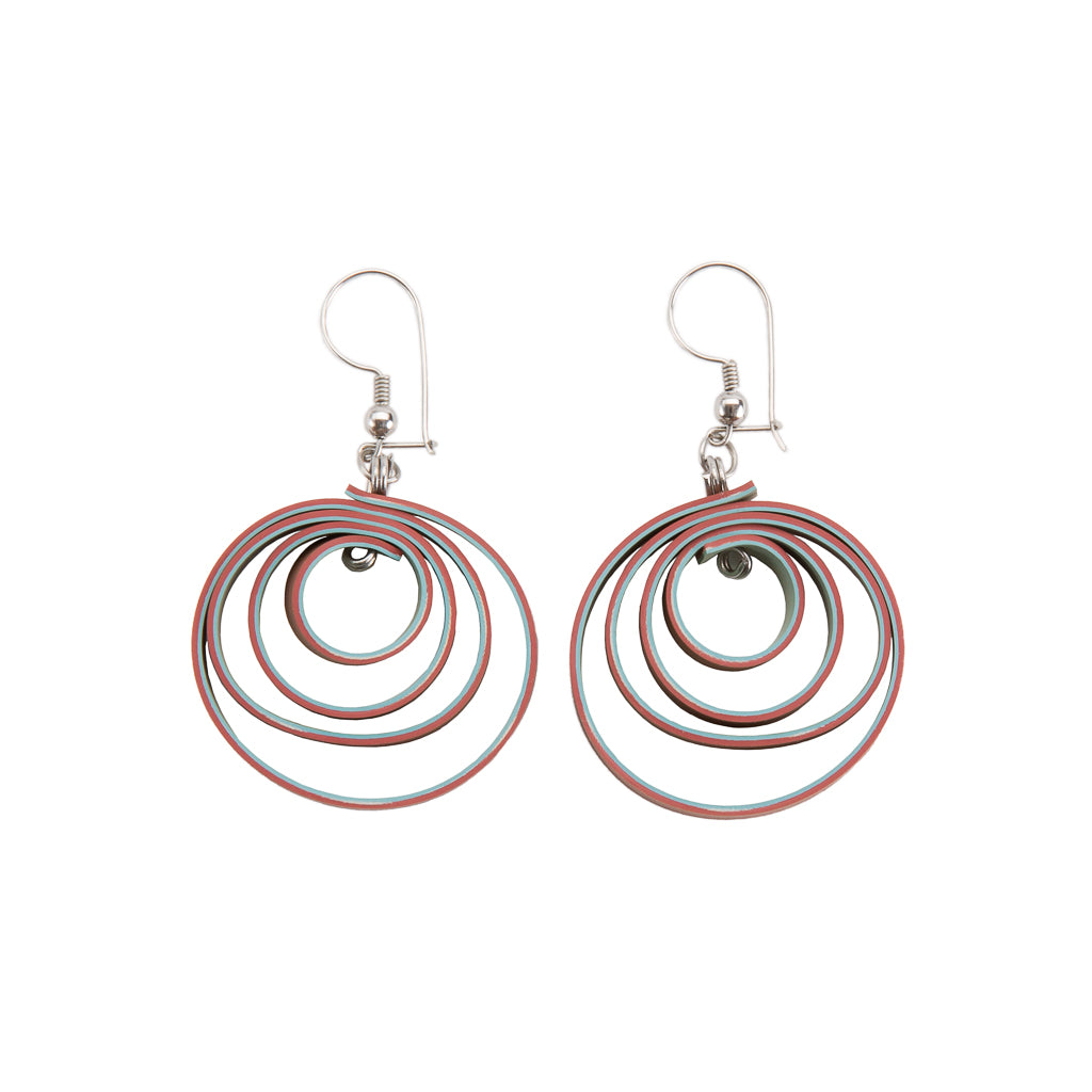 Twirl Recycled Rubber Vegan Earrings in pastel colors, handcrafted from recycled materials with sterling silver hooks.