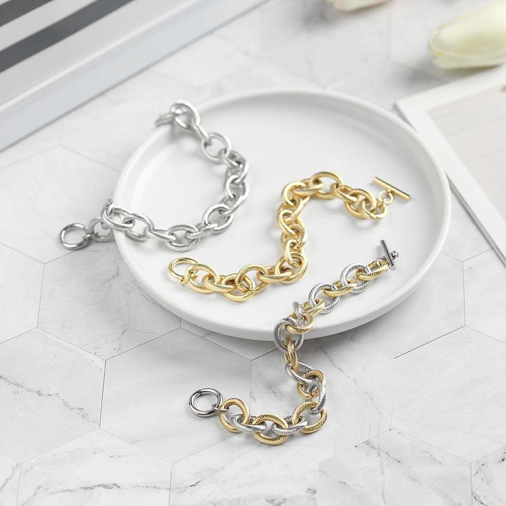 Twisted Wire Link Bracelet made of 316L surgical stainless steel with 14K gold PVD plating, showcasing its elegant twisted design.