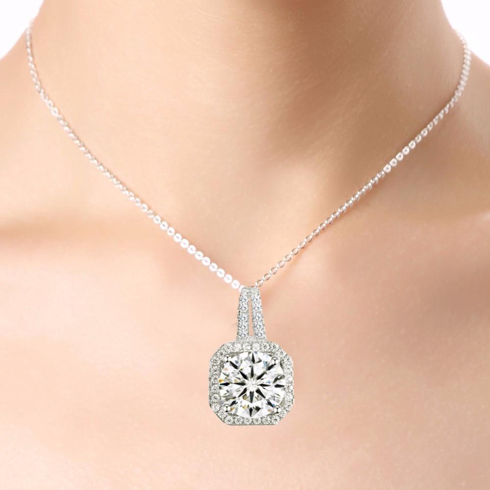 Two Carat Halo Cubic Zirconia Pendant Necklace featuring a stunning halo design with 18K white gold plating and genuine Austrian crystals.