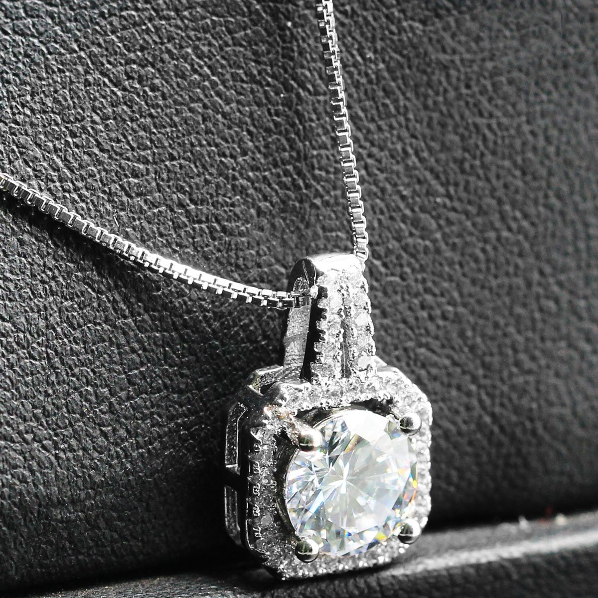 Two Carat Halo Cubic Zirconia Pendant Necklace featuring a stunning halo design with 18K white gold plating and genuine Austrian crystals.