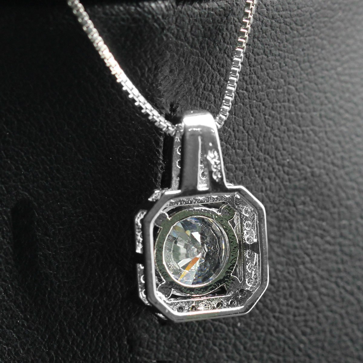 Two Carat Halo Cubic Zirconia Pendant Necklace featuring a stunning halo design with 18K white gold plating and genuine Austrian crystals.