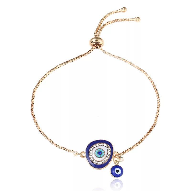 Two is Better Than One Evil Eye Adjustable Bracelet featuring large and small evil eye charms on a stylish adjustable band.