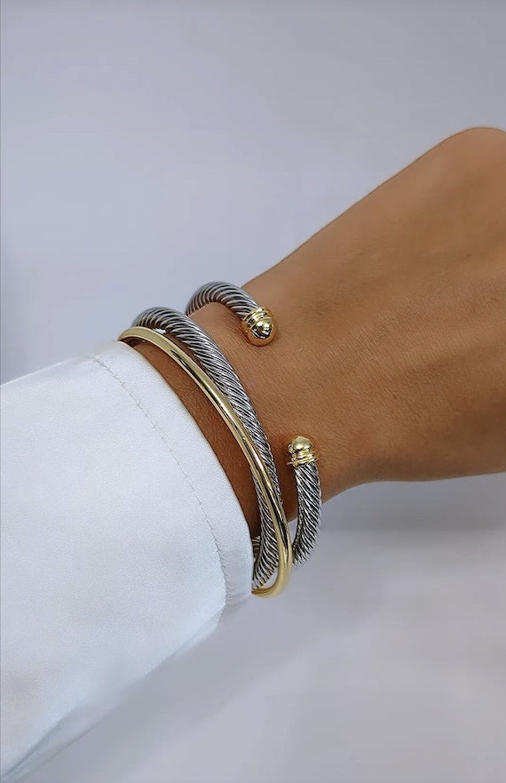 Two Tone Double Cable Bangle featuring 18K Gold Filled accents and a delicate cable pattern.