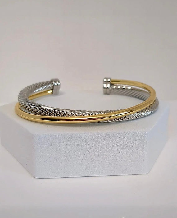 Two Tone Double Cable Bangle featuring 18K Gold Filled accents and a delicate cable pattern.