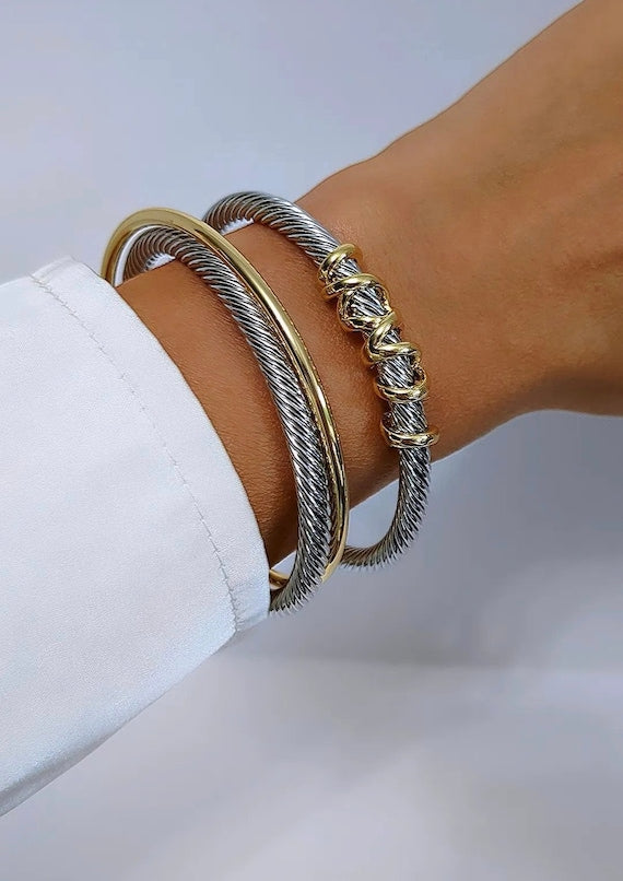 Two Tone Double Cable Bangle featuring 18K Gold Filled accents and a delicate cable pattern.