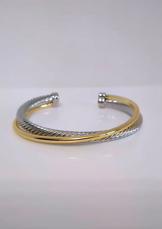 Two Tone Double Cable Bangle featuring 18K Gold Filled accents and a delicate cable pattern.