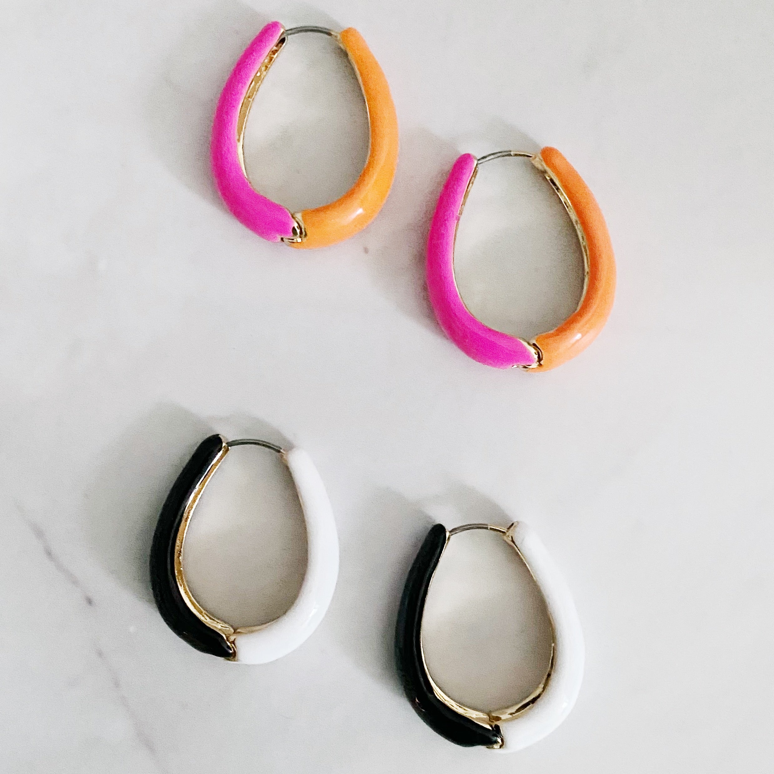 Two Toned Reversible Hoop Earrings featuring gold plating and epoxy color finish, showcasing a stylish and versatile design.