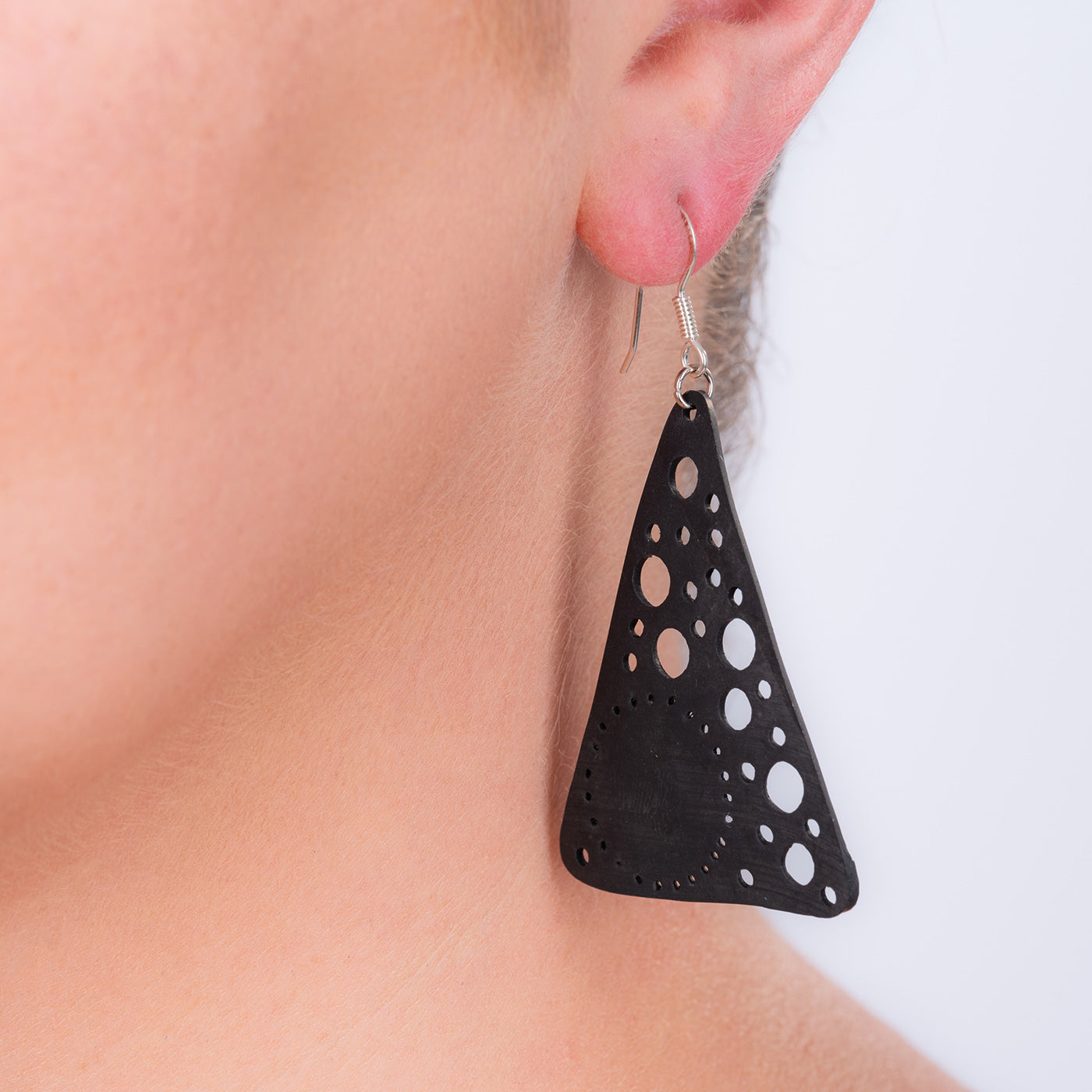 Unique Recycled Rubber Triangle Earrings featuring handcrafted design from upcycled inner tubes with sterling silver hooks.