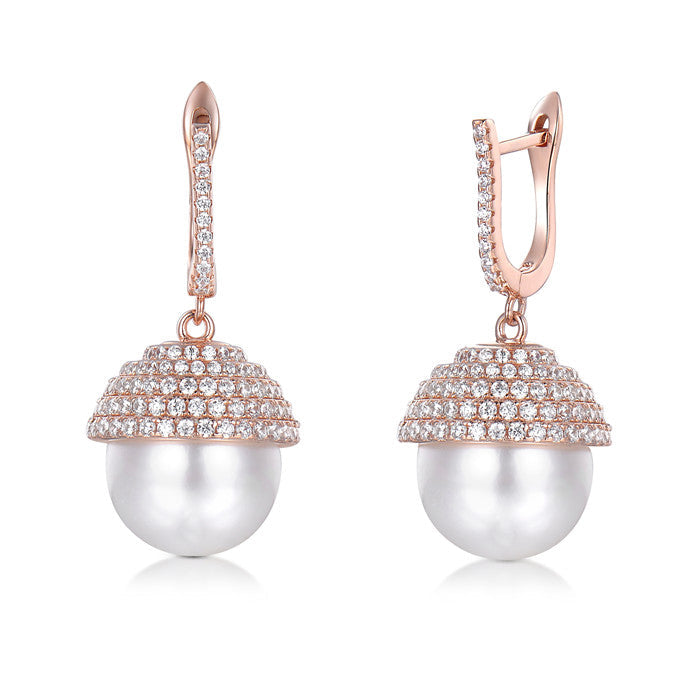 Elegant unique shell pearl dangle earrings made of 925 sterling silver with 18k rose gold finish, featuring white sapphire and 12mm shell pearl.