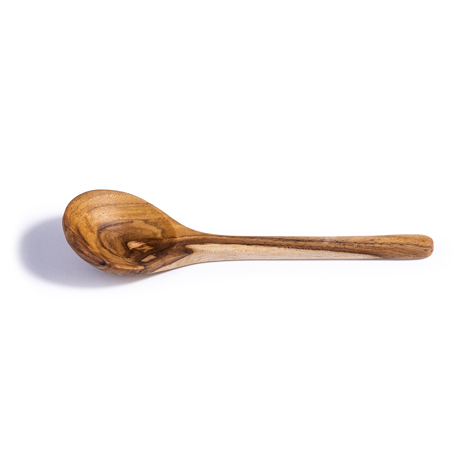 A beautifully handcrafted upcycled wooden spoon made from reclaimed teak wood, showcasing unique grain patterns and a polished finish.