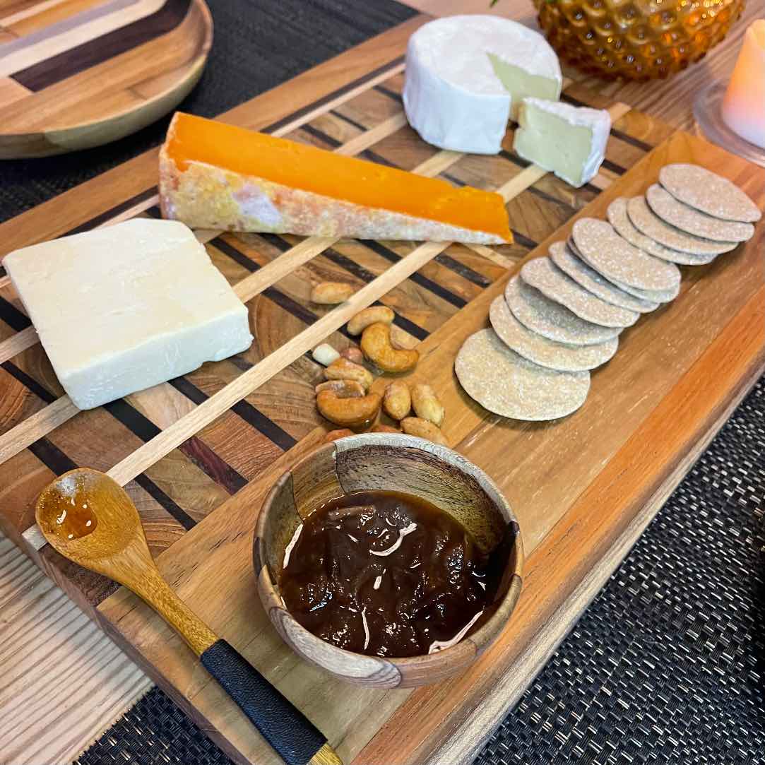 Upcycled End Grain Cutting Board made from reclaimed teak, rosewood, and jackfruit, showcasing unique patterns and craftsmanship.