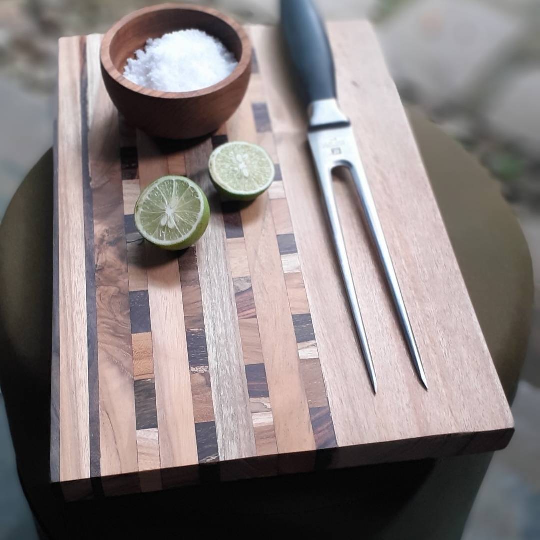 Upcycled End Grain Cutting Board made from reclaimed teak, rosewood, and jackfruit, showcasing unique patterns and craftsmanship.