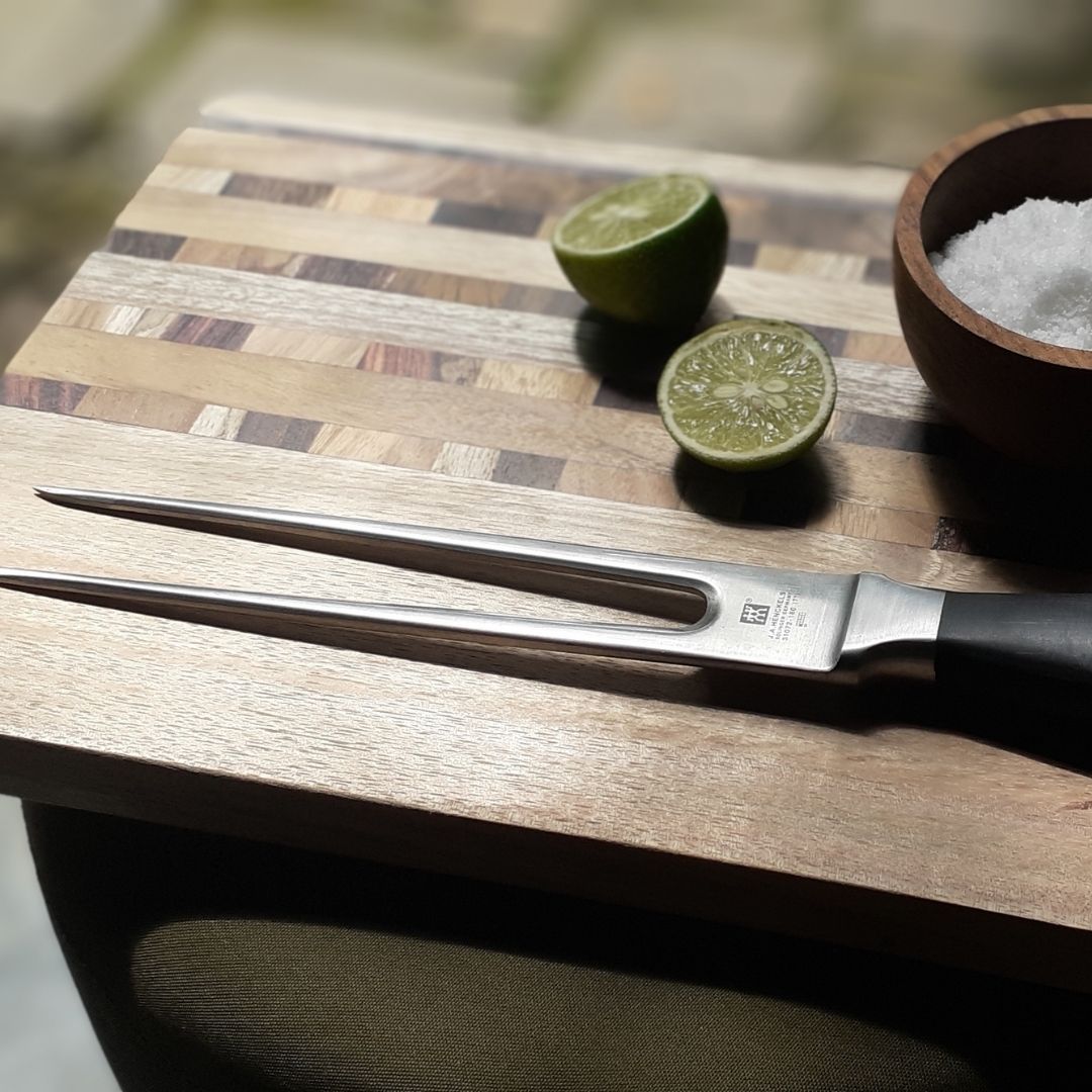 Upcycled End Grain Cutting Board made from reclaimed teak, rosewood, and jackfruit, showcasing unique patterns and craftsmanship.