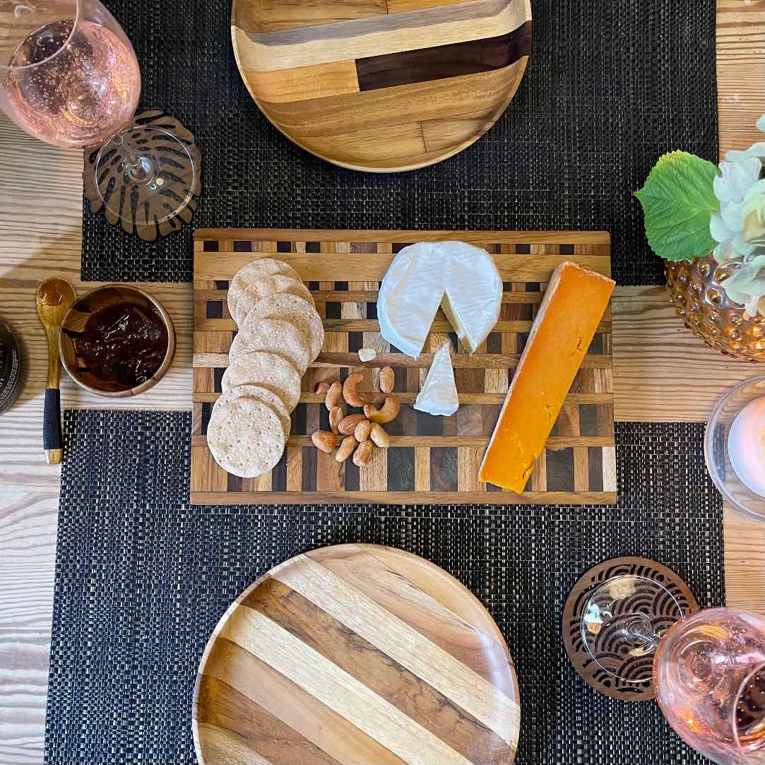 Upcycled End Grain Cutting Board made from reclaimed teak, rosewood, and jackfruit, showcasing unique patterns and craftsmanship.