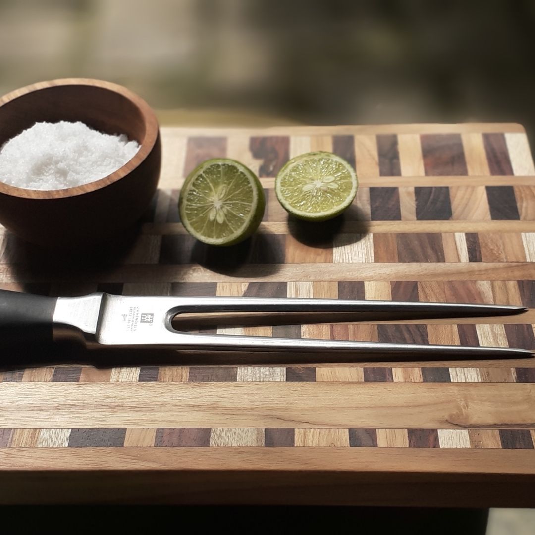 Upcycled End Grain Cutting Board made from reclaimed teak, rosewood, and jackfruit, showcasing unique patterns and craftsmanship.