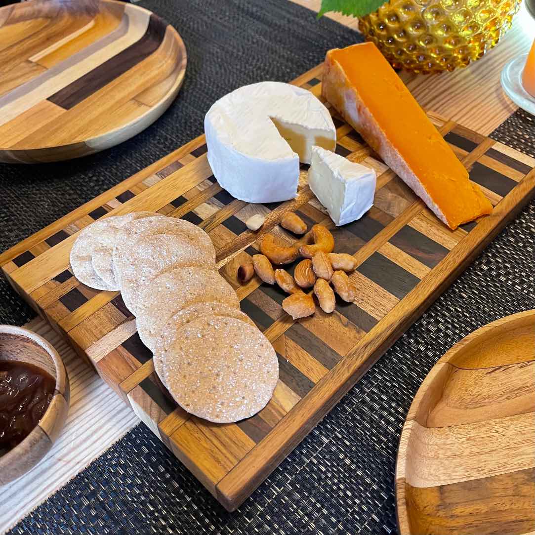 Upcycled End Grain Cutting Board made from reclaimed teak, rosewood, and jackfruit, showcasing unique patterns and craftsmanship.