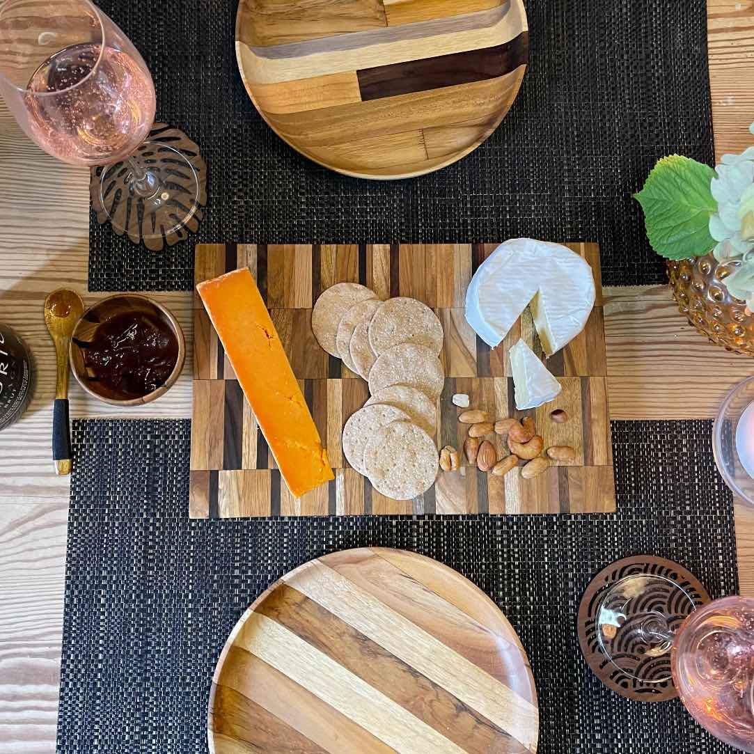 Upcycled End Grain Cutting Board made from reclaimed teak, rosewood, and jackfruit, showcasing unique patterns and craftsmanship.