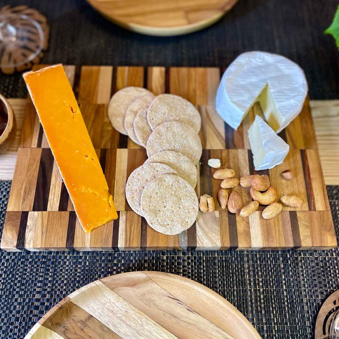 Upcycled End Grain Cutting Board made from reclaimed teak, rosewood, and jackfruit, showcasing unique patterns and craftsmanship.