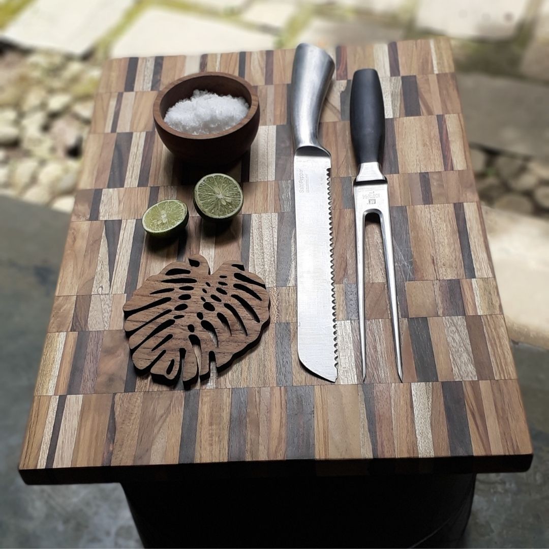 Upcycled End Grain Cutting Board made from reclaimed teak, rosewood, and jackfruit, showcasing unique patterns and craftsmanship.