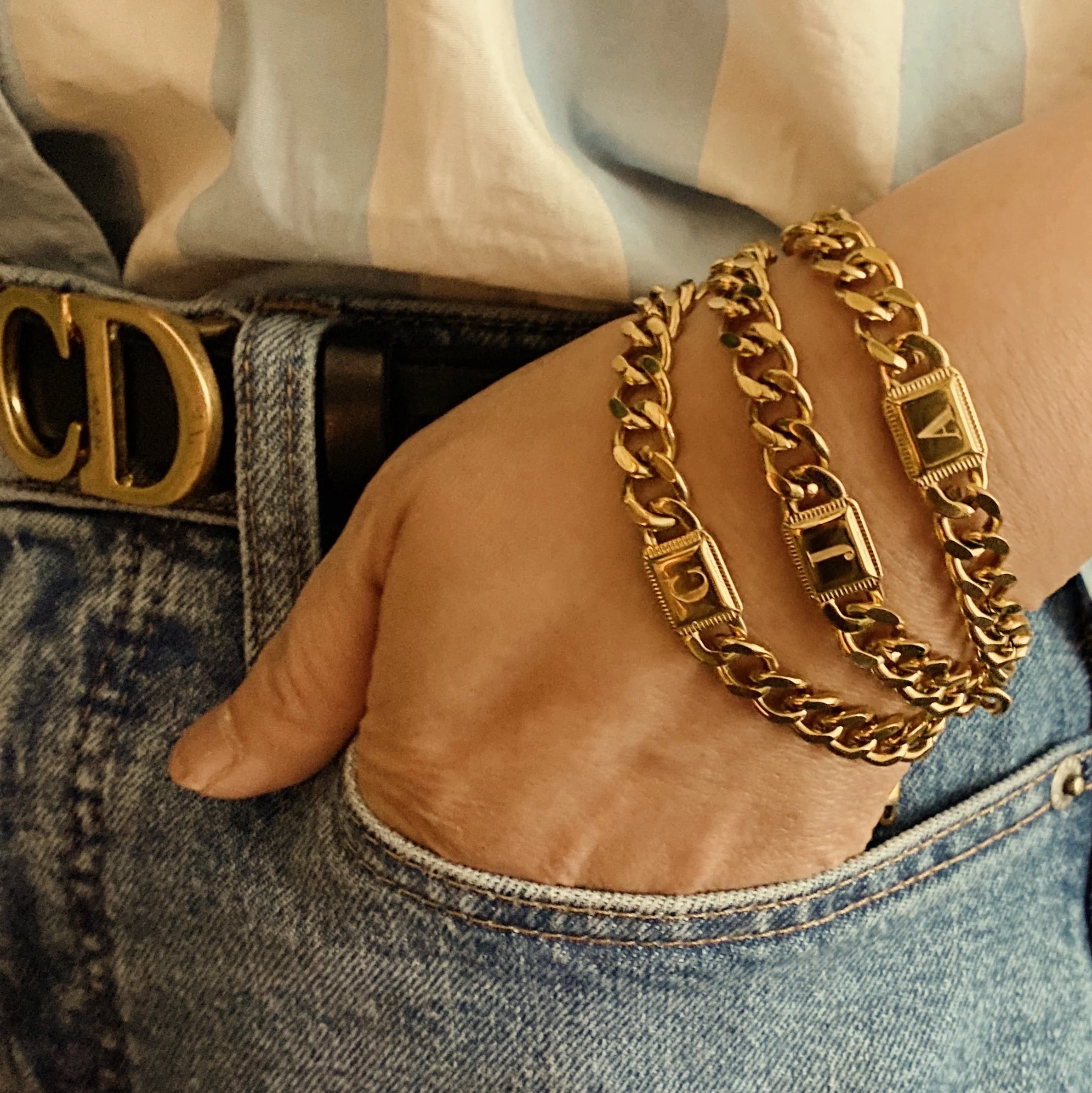 Uptown Cuban Chain Initial Bracelet featuring a personalized engraved initial tag, crafted from 18k gold plated stainless steel.