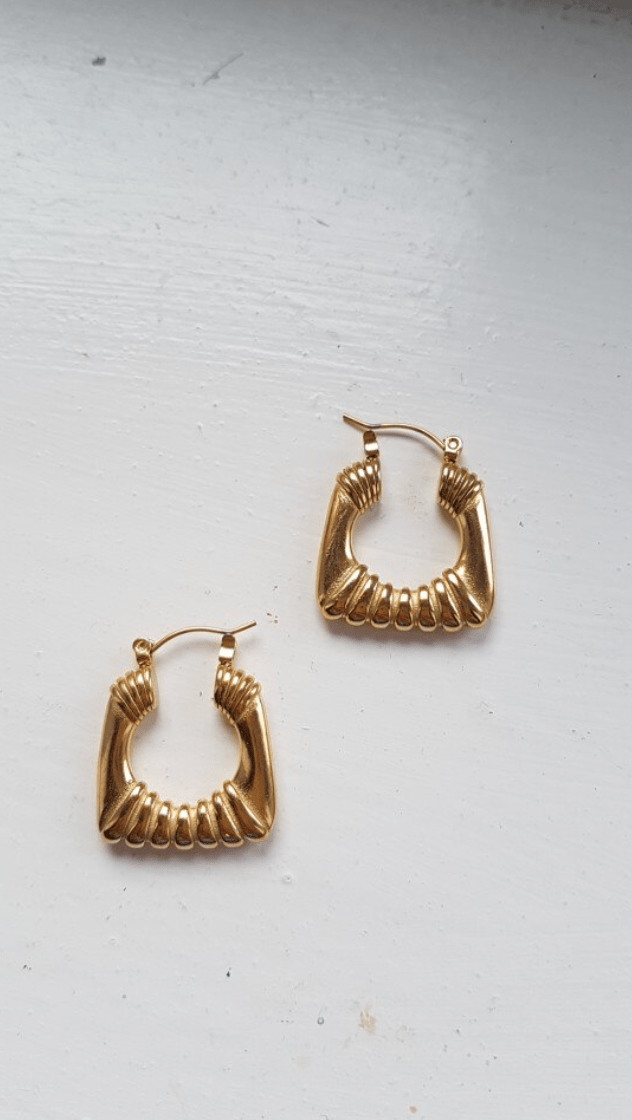 Valentina Square Statement Hoops in 18Kt yellow gold plated stainless steel, showcasing a unique square design with a textured finish.