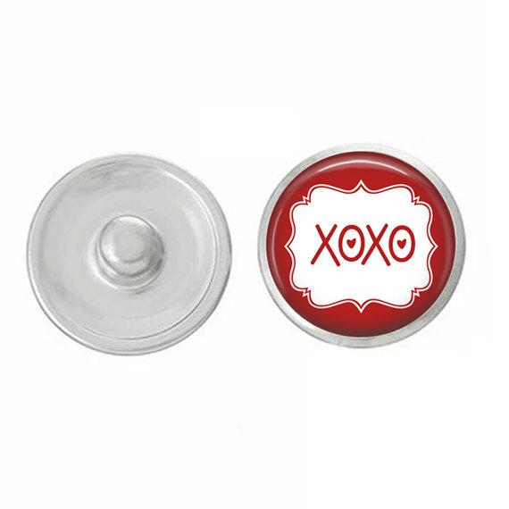 Hugs and Kisses XOXO Snap Jewelry featuring hand-pressed round snaps in vibrant colors, perfect for Valentine's Day gifts.