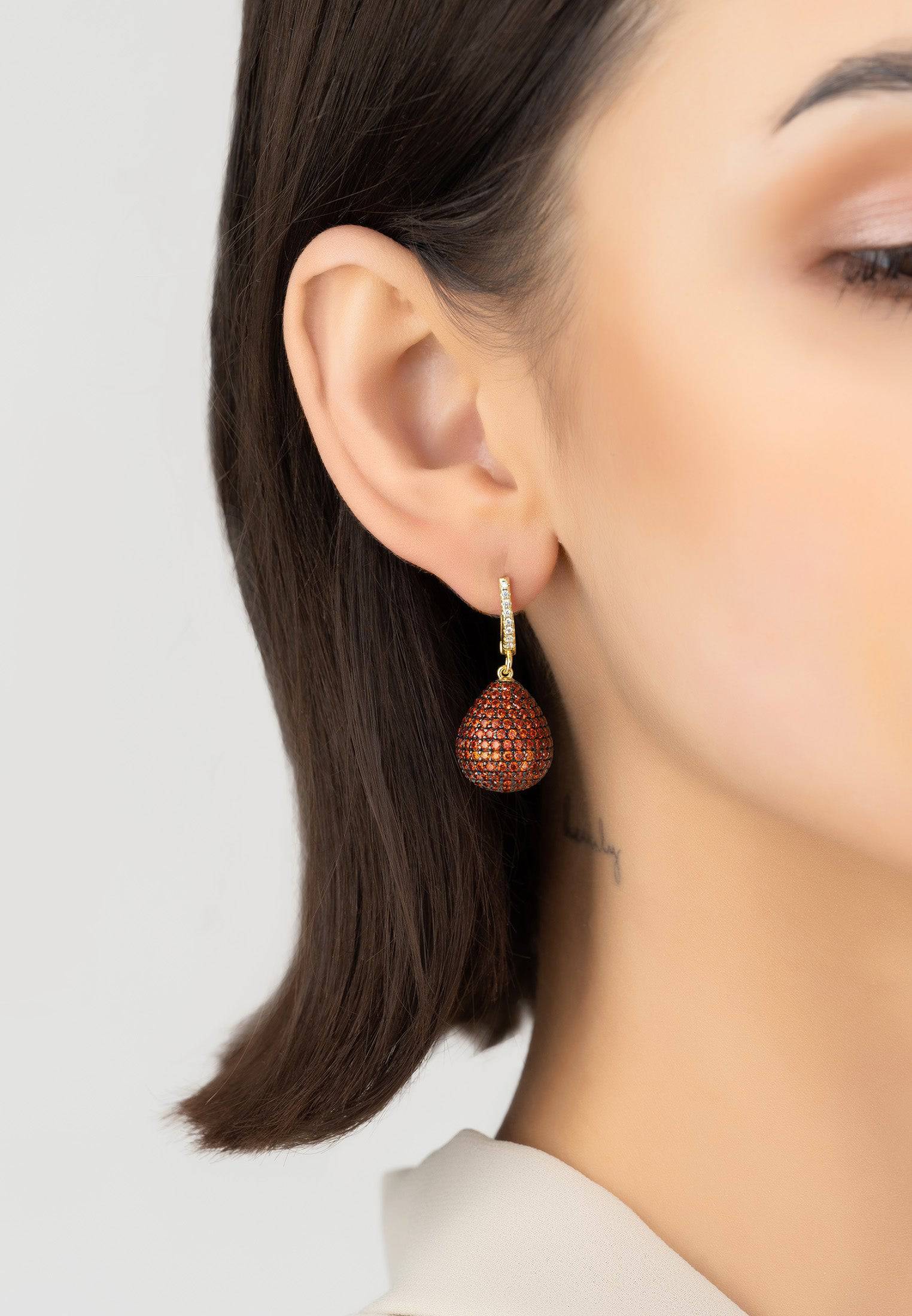 Valerie Pear Drop Gemstone Earrings in Gold Burnt Orange, featuring a brilliant-cut design with sparkling zirconia and a creole fastening.