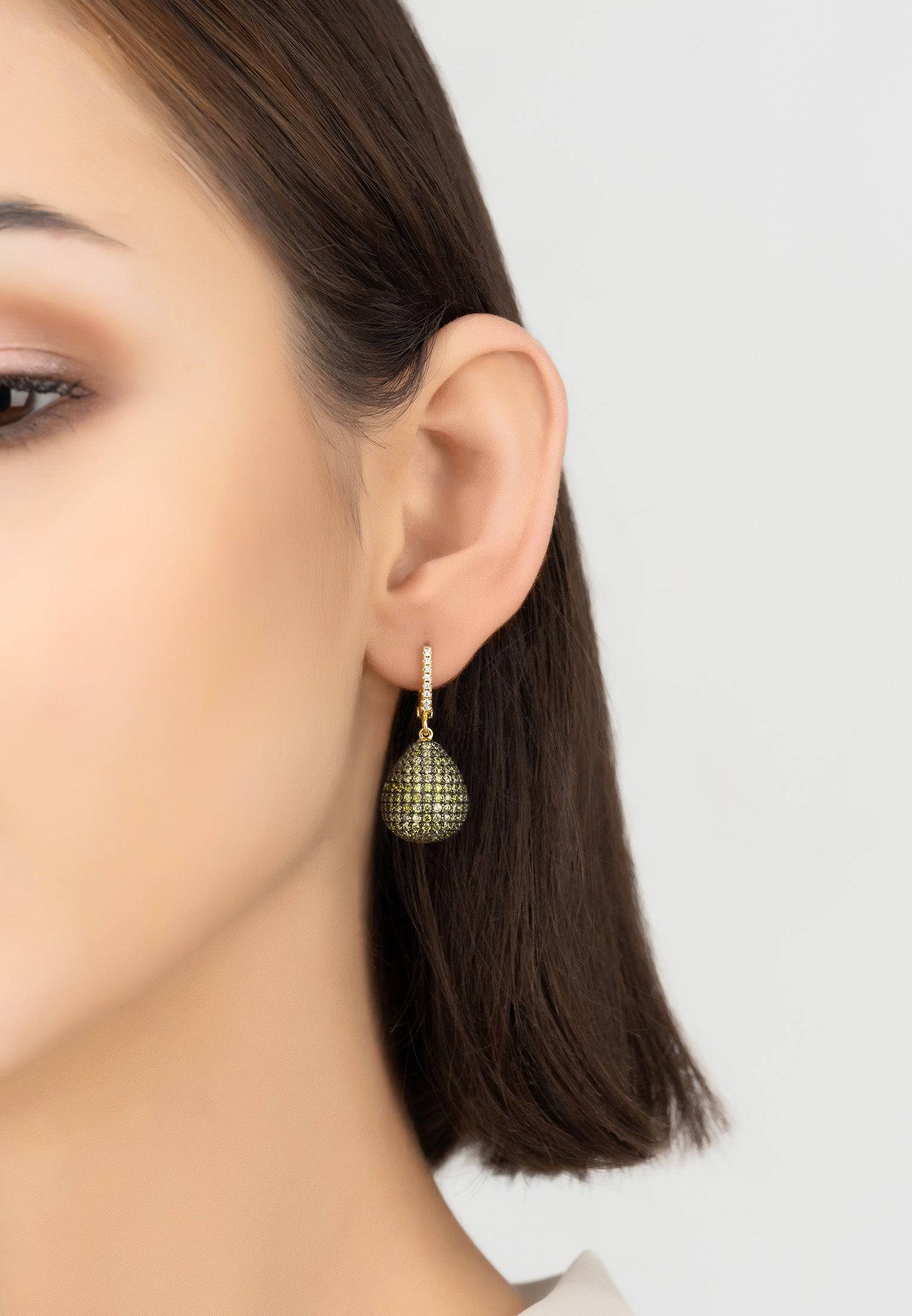 Valerie Pear Drop Gemstone Earrings in Gold Peridot, featuring a pear-shaped design with sparkling zirconia and a creole fastening.