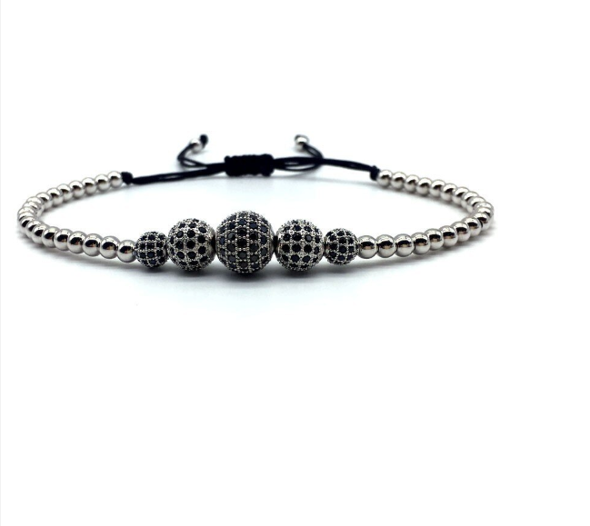 Valiant Steel Bracelet CZ featuring five premium black zircon beads and electroplated silver pearls on a braided flax rope.