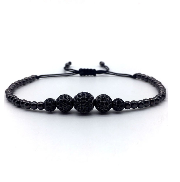 Valiant Steel Bracelet cz featuring five black zircon beads and braided flax rope, elegantly designed for all wrist sizes.