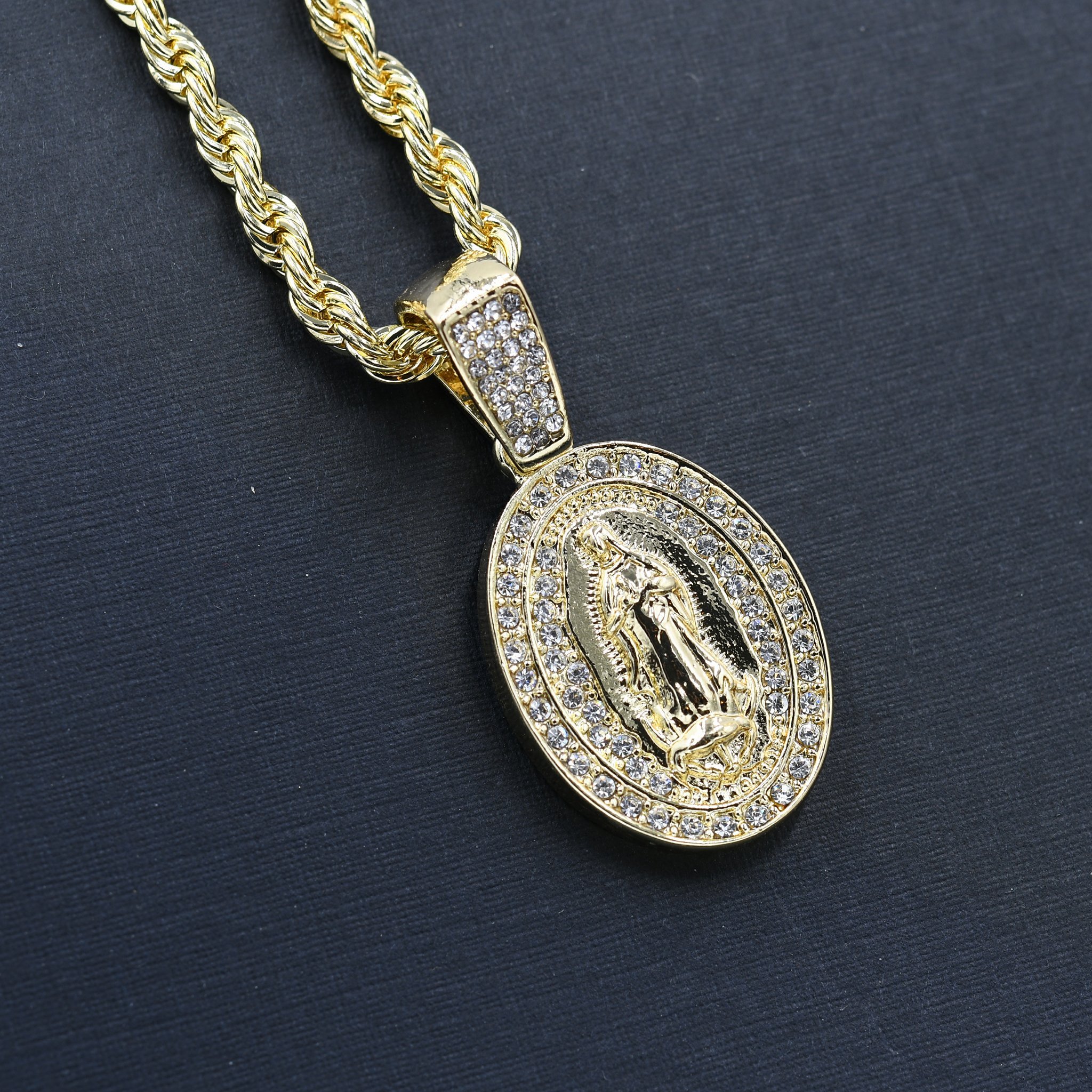 VERSION MERRY CHAIN AND CHARM - D910272 featuring a crystal-studded pendant on a 24'' rope chain, showcasing intricate design and sparkling details.