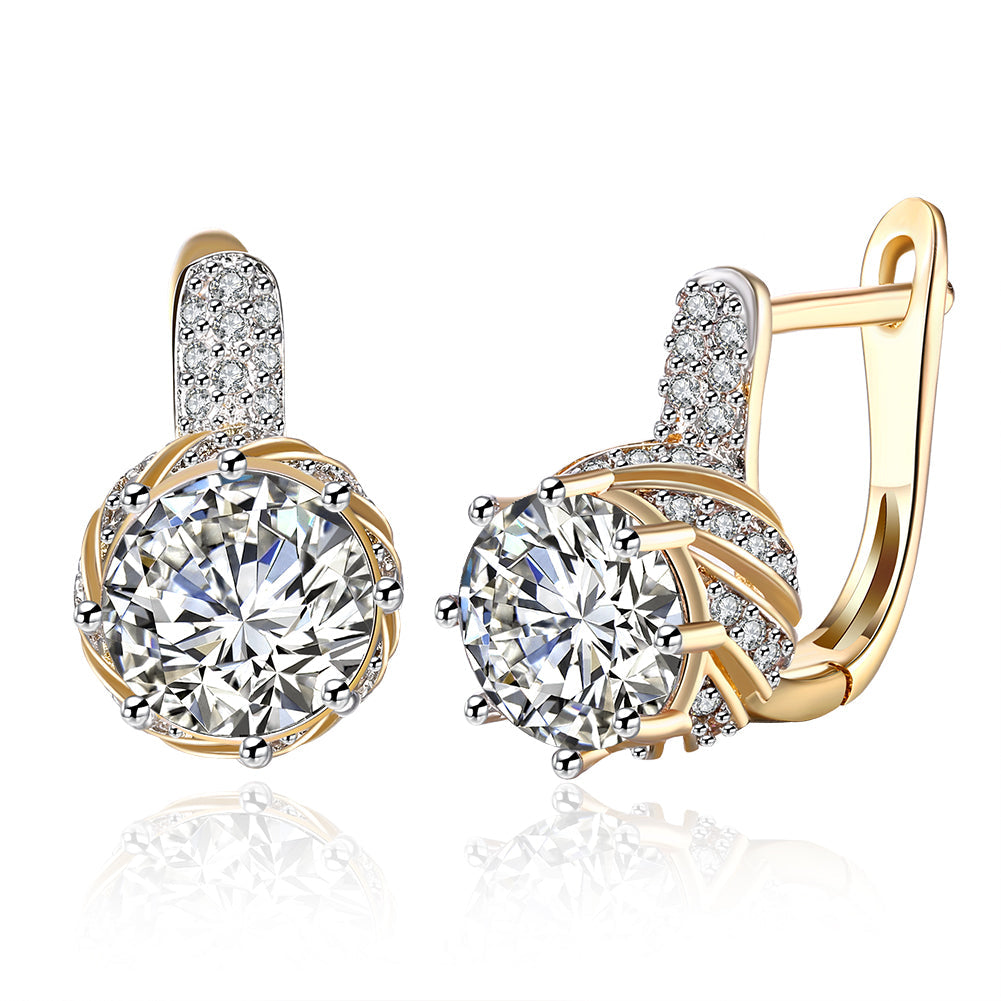 Elegant Vienna 1.00 Ct White Topaz Round Cut Huggie Earrings in 18K Gold Plated, showcasing their sparkling design and luxurious finish.