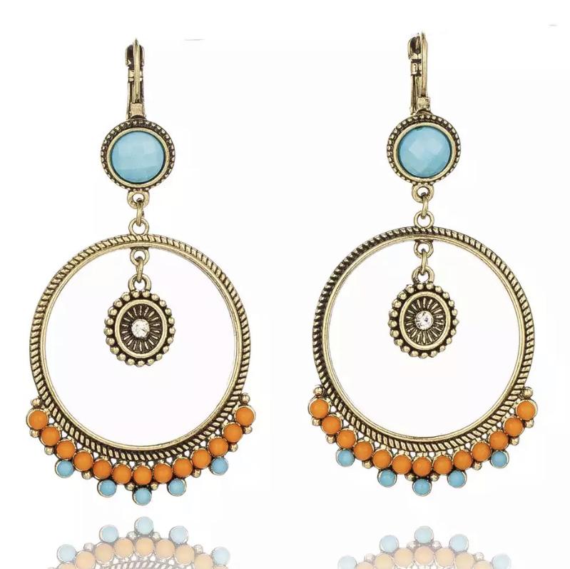 A pair of Vintage Boho Dangle Hoop Earrings featuring intricate designs, gold plating, and a comfortable latch back closure.