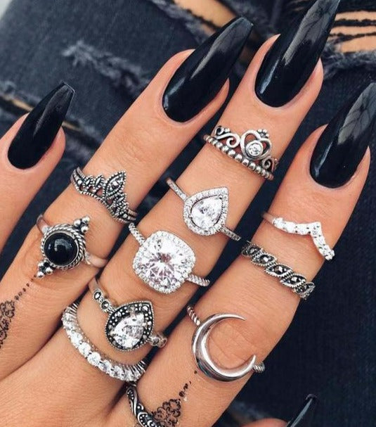 Vintage Boho Women's 11 Piece Rings Set featuring unique designs and alloy material, perfect for layering and stacking.