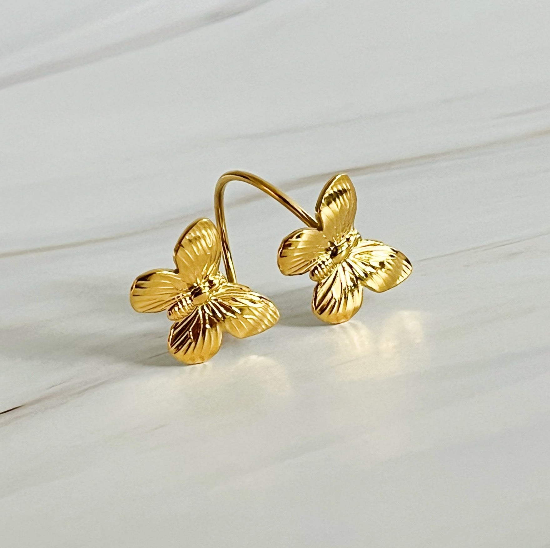 Elegant Vintage Butterfly Duo Ring featuring intricate butterfly design in 18k gold plated stainless steel.