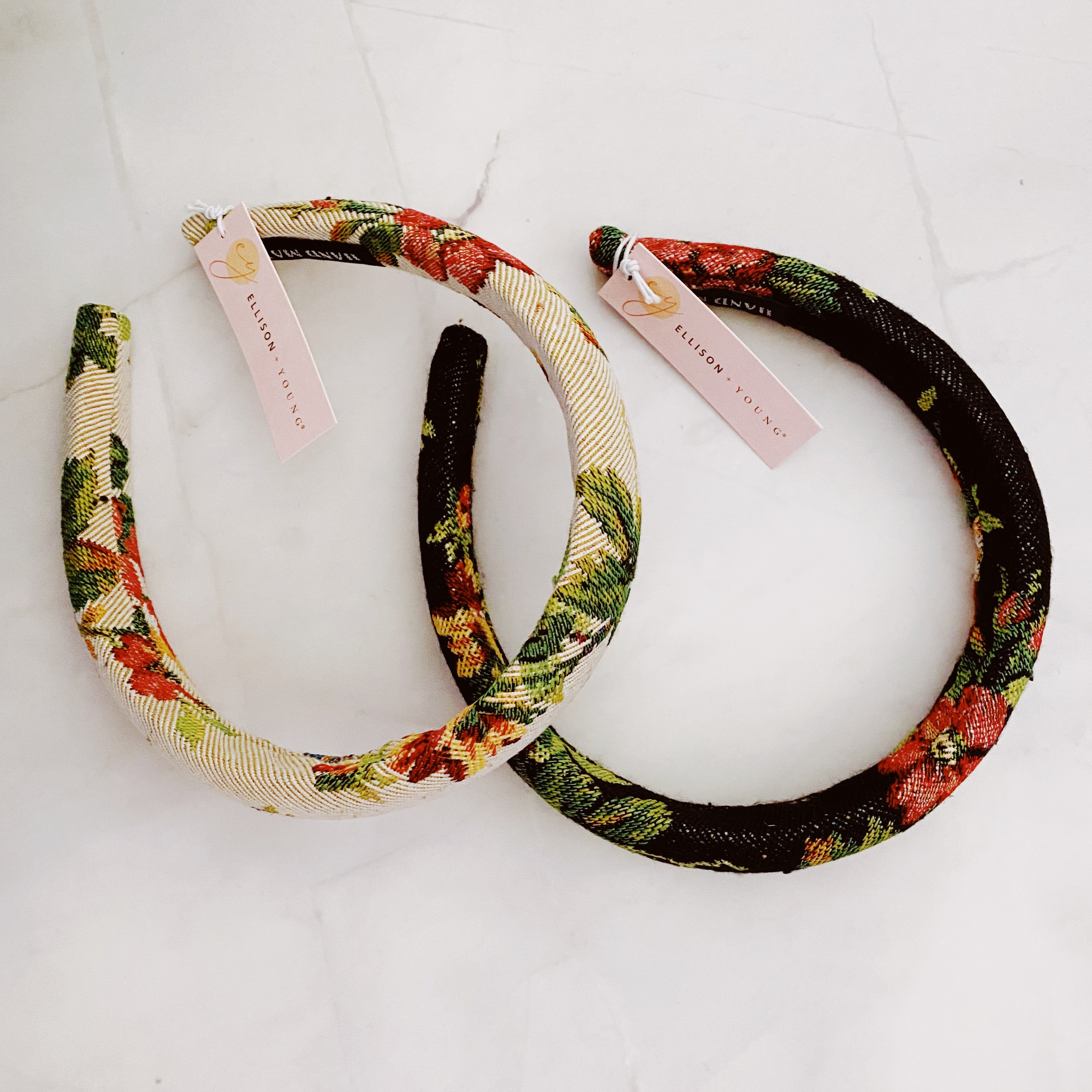 A beautifully crafted Vintage Garden Floral Headband featuring a retro tapestry flower pattern with soft edges for comfort.