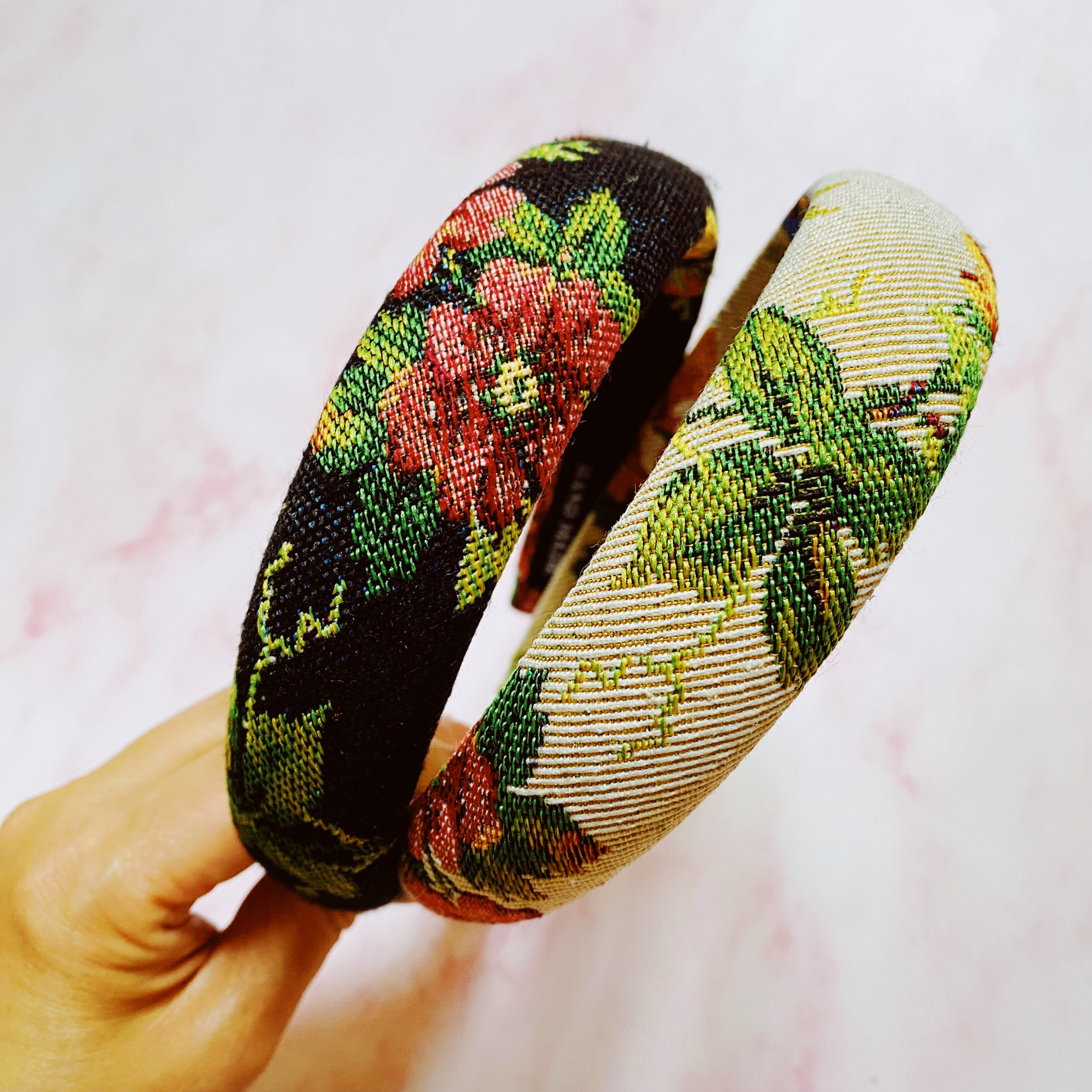 A beautifully crafted Vintage Garden Floral Headband featuring a retro tapestry flower pattern with soft edges for comfort.