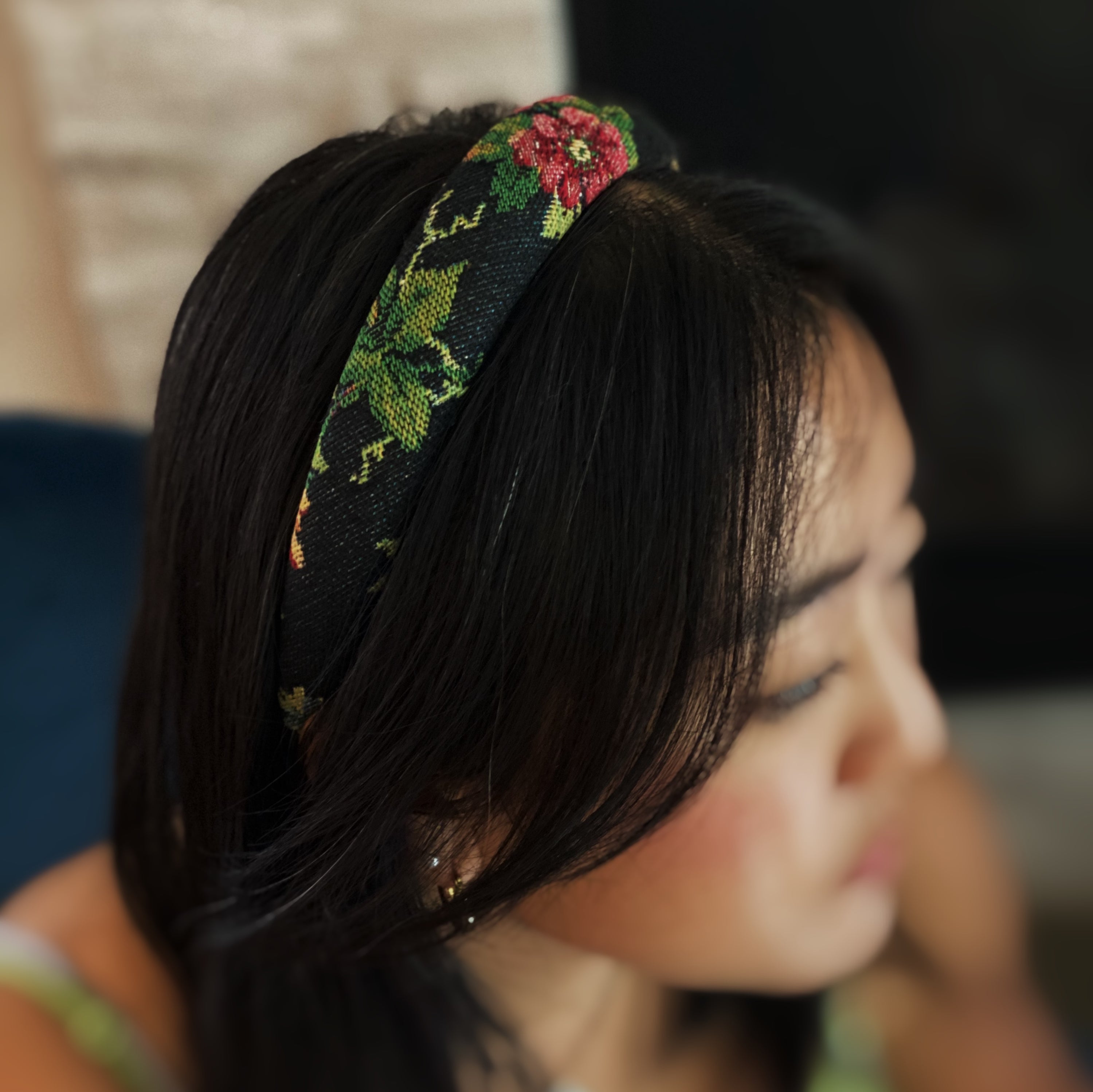 A beautifully crafted Vintage Garden Floral Headband featuring a retro tapestry flower pattern with soft edges for comfort.