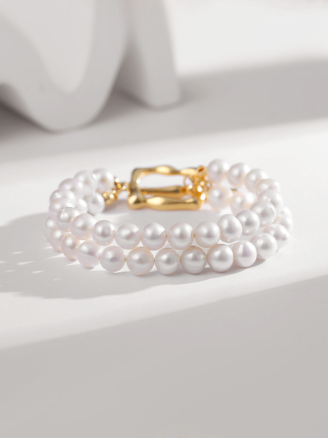 Vintage Style Double Layered T-bar Bracelet featuring natural Baroque pearls and gold vermeil, elegantly designed for a timeless look.