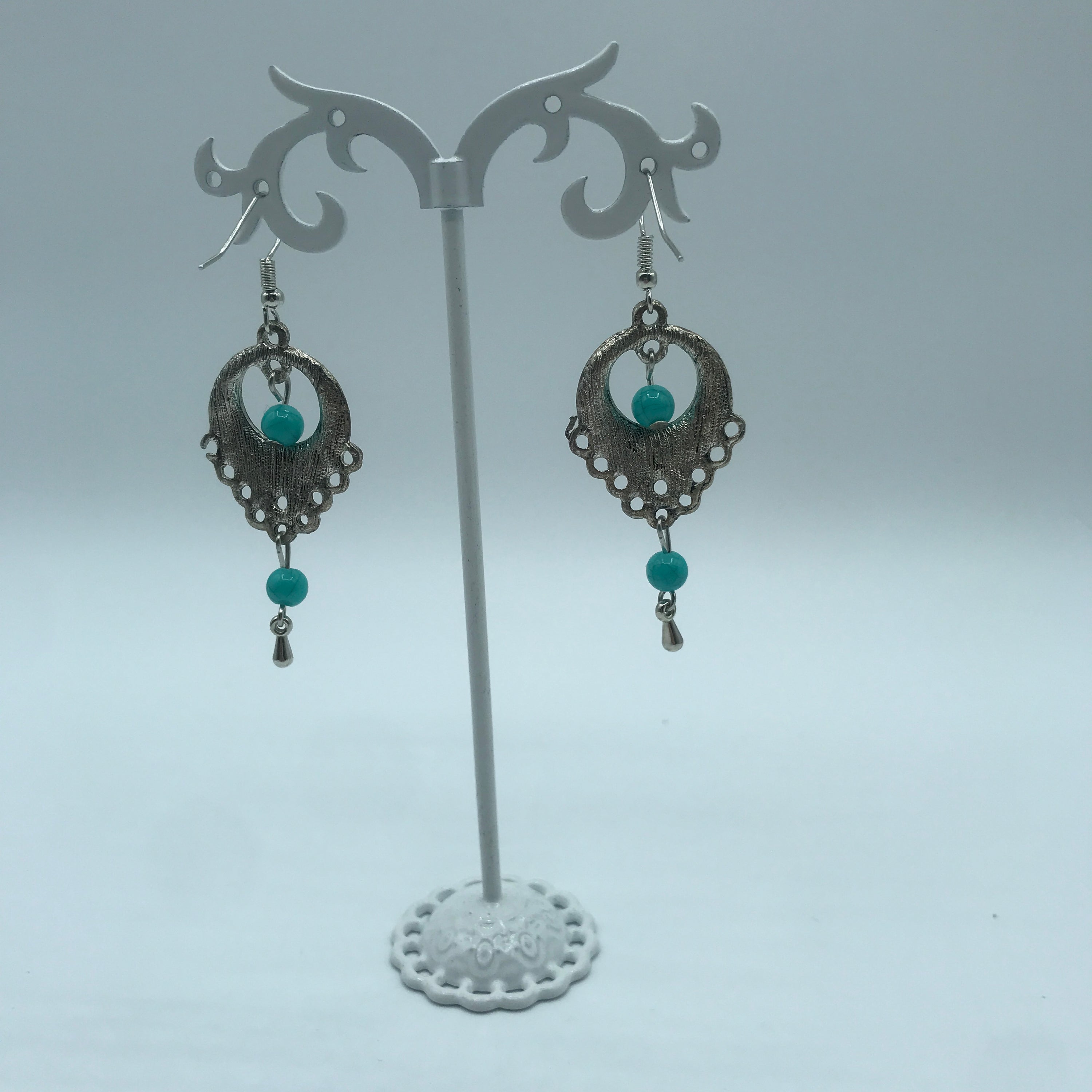 Elegant vintage turquoise slinky drop earrings made from alloy and 925 silver, featuring sparkling rhinestones.