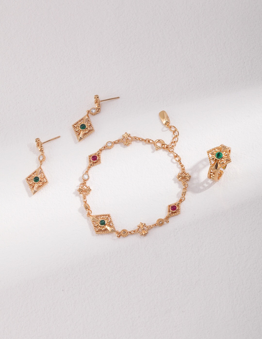 A vintage-style zircon bracelet featuring sparkling zircon stones set in tarnish-resistant sterling silver with gold vermeil accents, elegantly displayed.