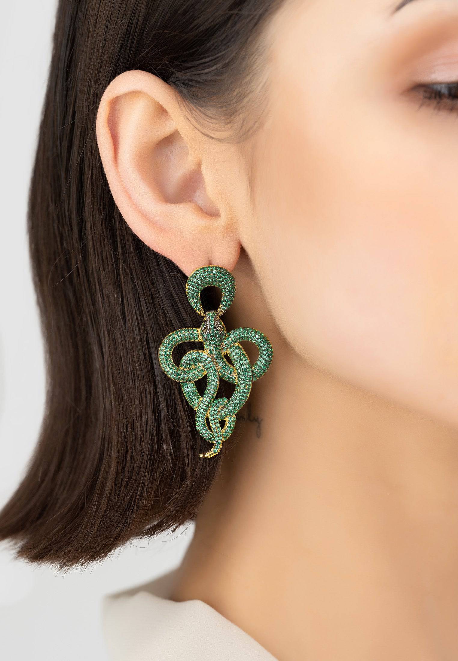 Elegant Viper Snake Drop Earrings in gold with emerald cubic zirconia, showcasing a unique curled snake design.