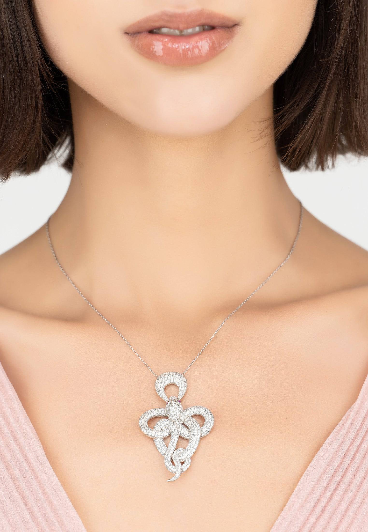 Viper Snake Pendant Necklace in silver white with sparkling zircons, showcasing an elegant snake design.