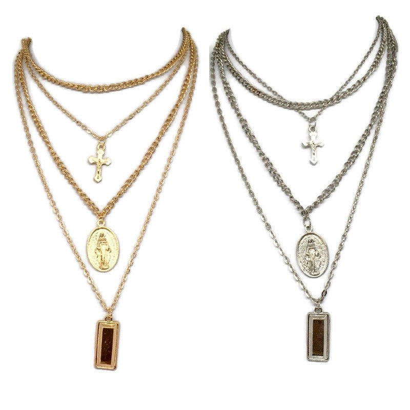 A layered necklace featuring a Virgin Mary pendant, crafted from 18ct gold and sterling silver plated steel alloy, showcasing elegance and spirituality.