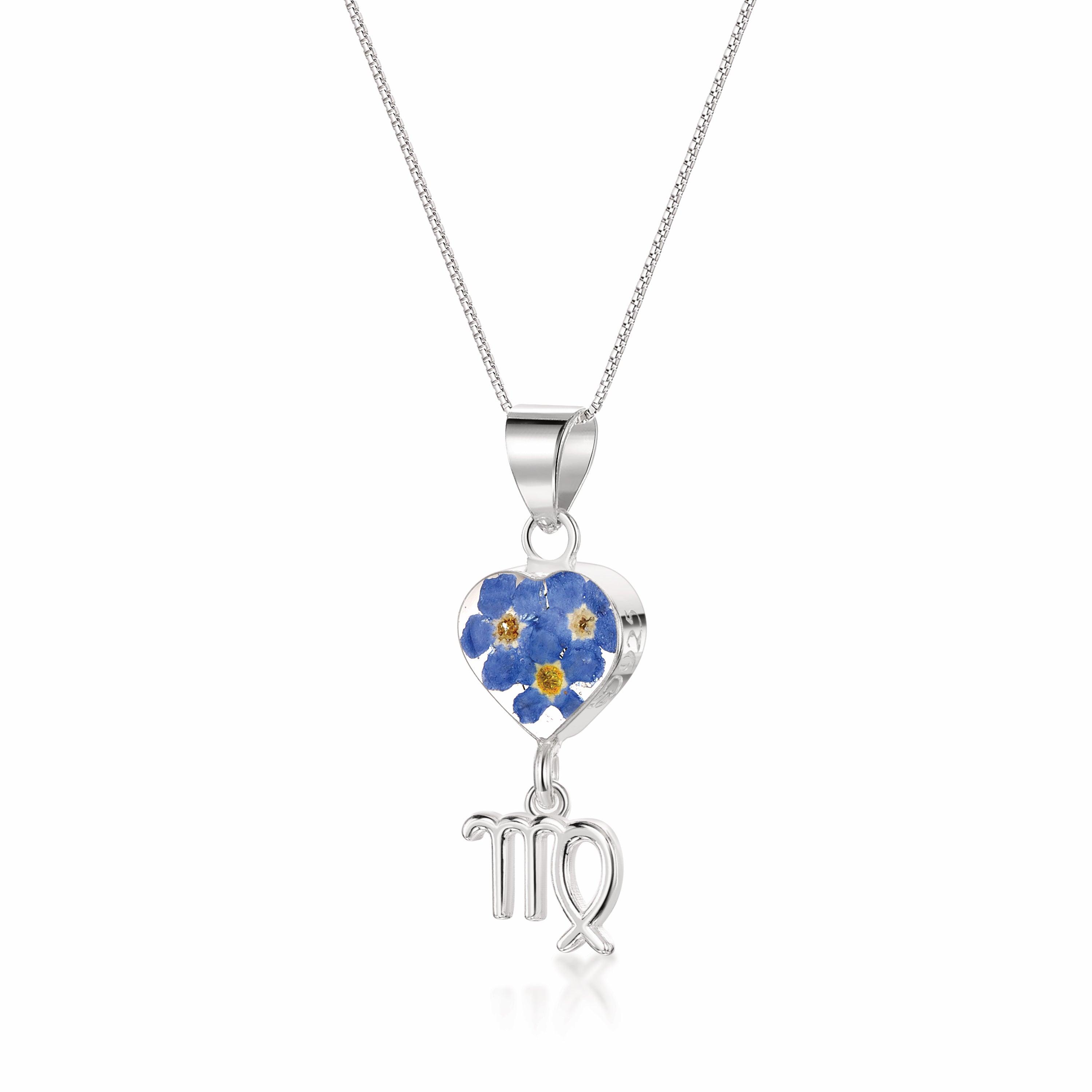 Virgo Necklace featuring a sterling silver pendant with real preserved flowers and a zodiac charm, elegantly displayed on a soft background.