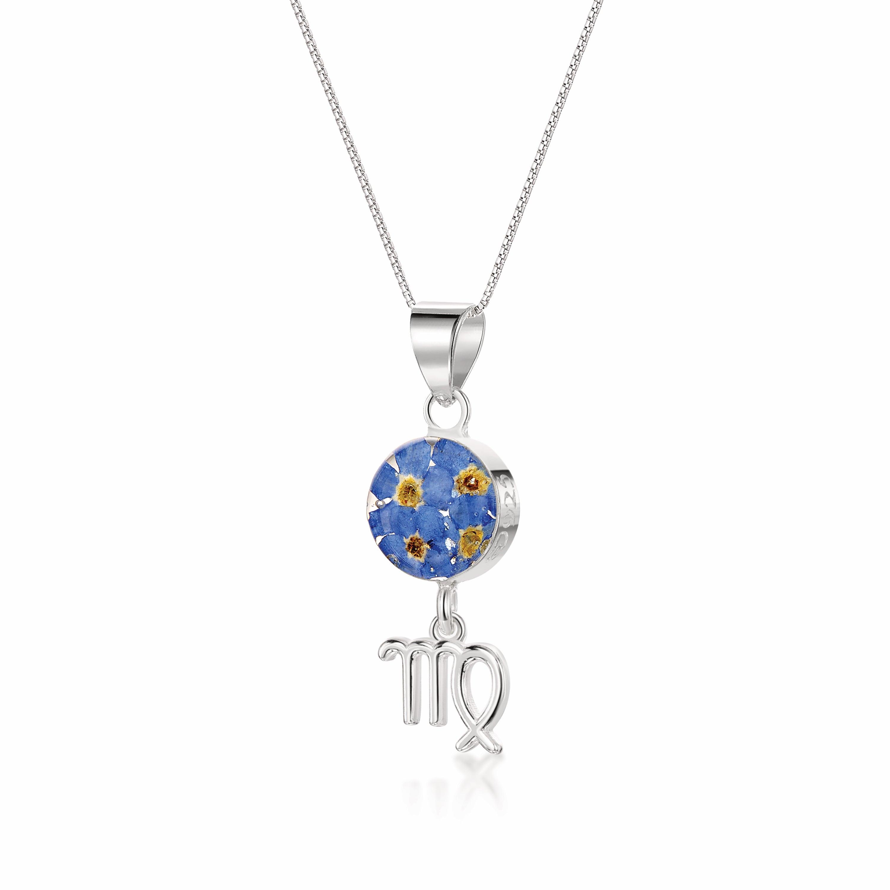 Virgo Necklace featuring a sterling silver pendant with real preserved flowers and a zodiac charm, elegantly displayed on a soft background.