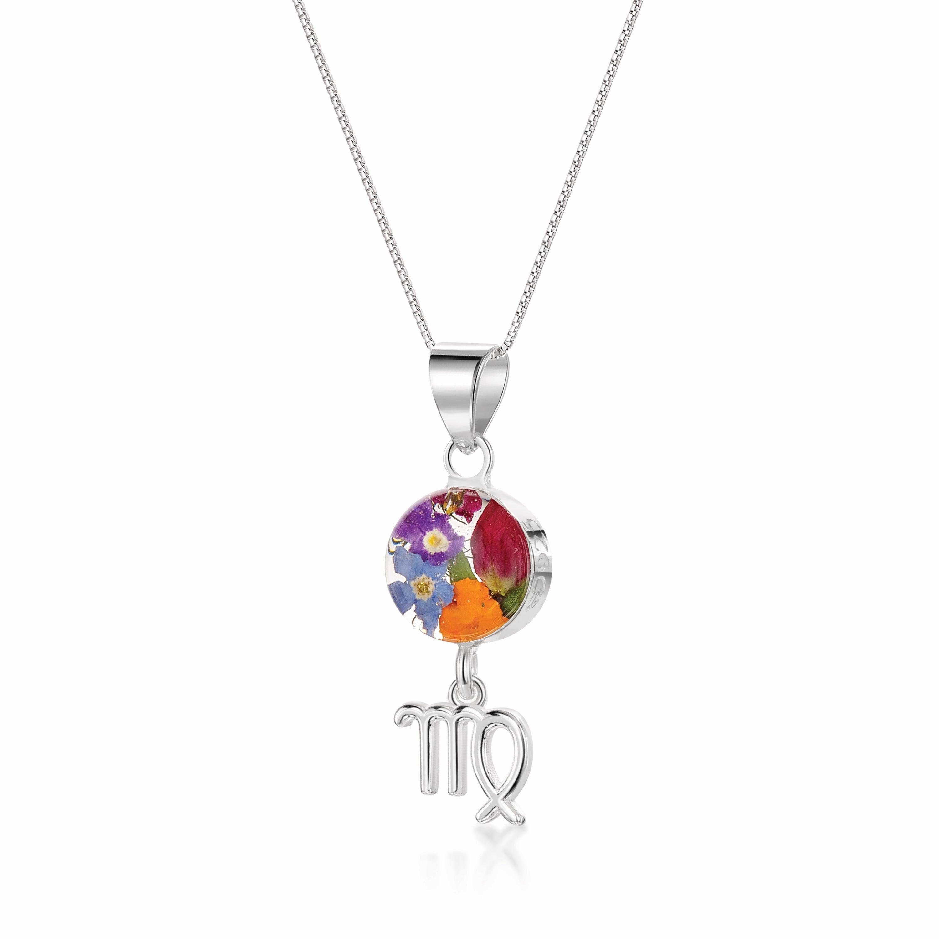 Virgo Necklace featuring a sterling silver pendant with real preserved flowers and a zodiac charm, elegantly displayed on a soft background.