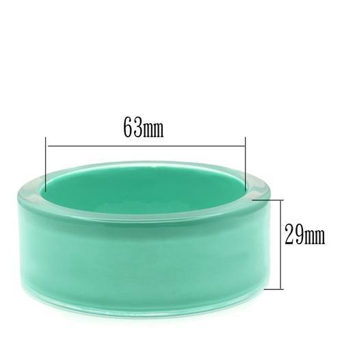 VL044 Resin Bangle featuring a vibrant synthetic emerald stone, showcasing its elegant design and lightweight structure.