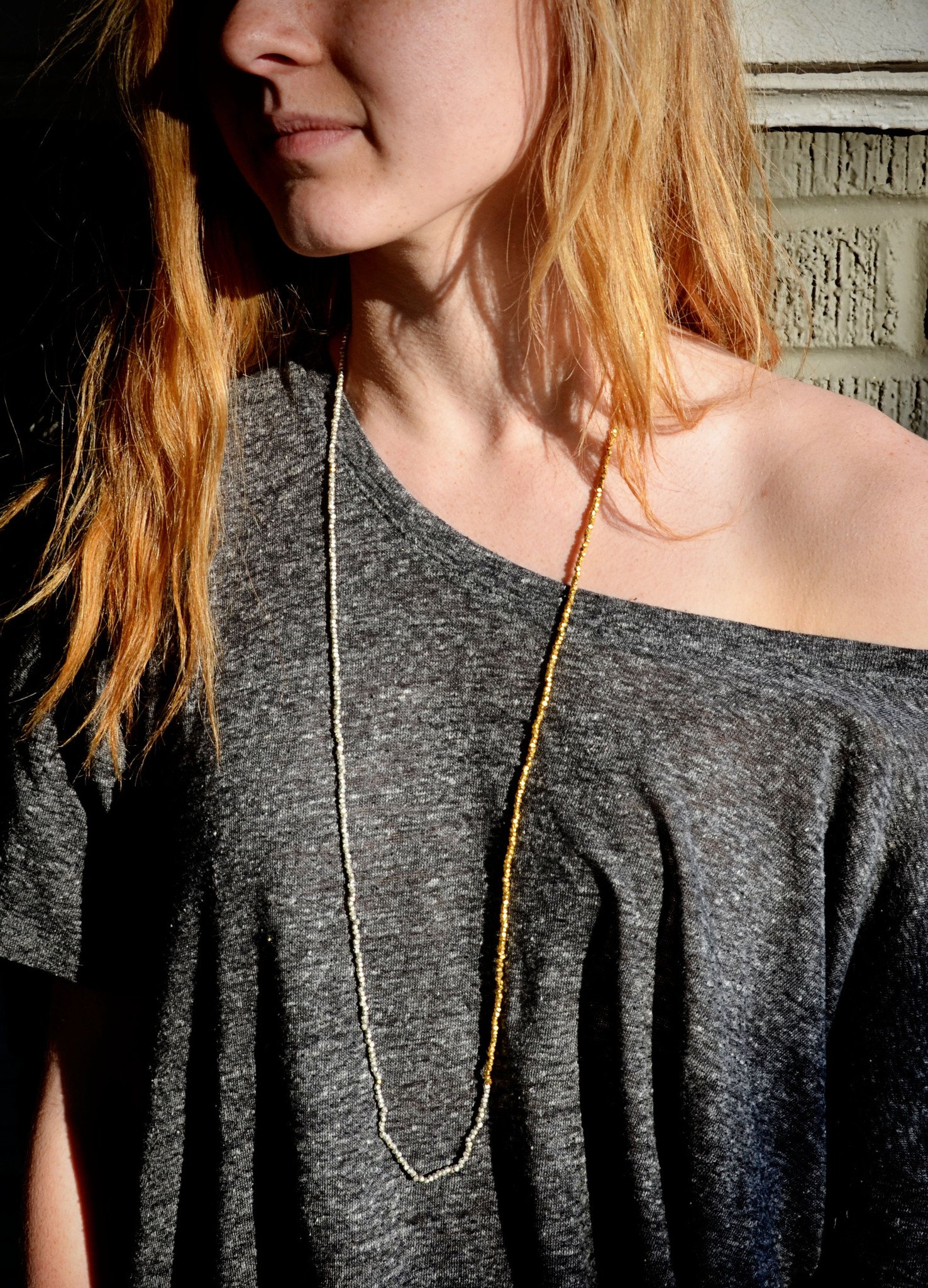 Wabi Sabi Necklace featuring handcut gold and silver beads, showcasing its unique design and craftsmanship.